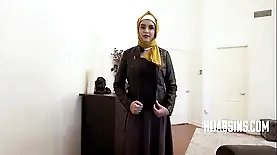 Young woman in hijab experiences first time with me