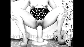 Mature Latina, Hotty Putta, enjoys using large dildos to stretch her vagina