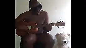 Masturbating with insect glasses and playing guitar solo